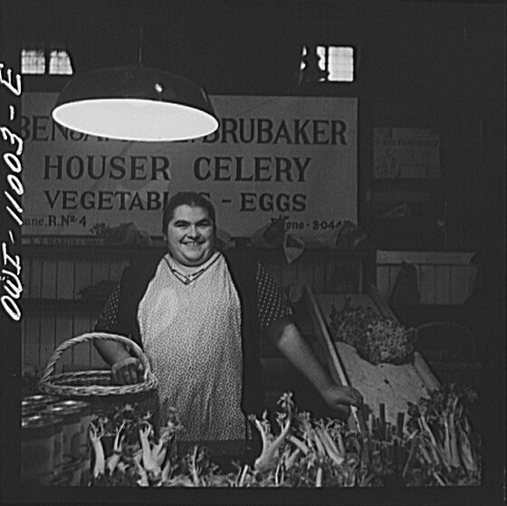 farm15 Mennonite woman at her Central Market stand 1942.jpg